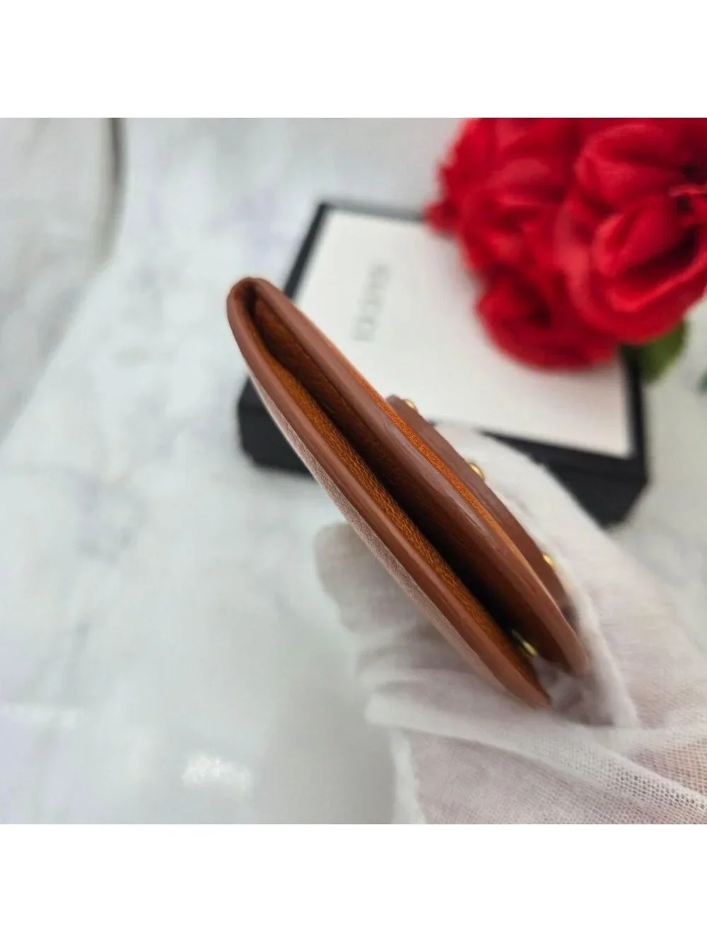 Gucci brown material